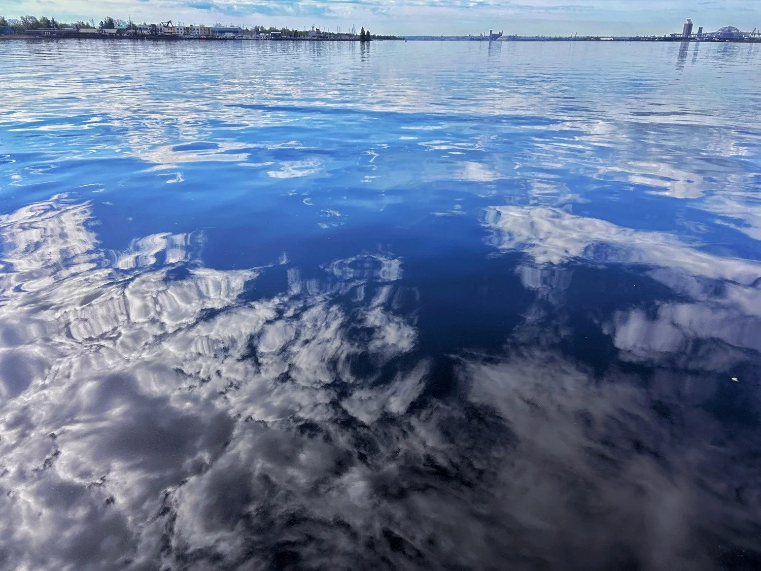 ✨
She said, "The lake is like an open book,
day like the steady gaze of a reader."

I said, "The day is a book we open between us,
the lake a sentence we read together
over and over, our voices
ghost, bread, and horizon."

Excerpt