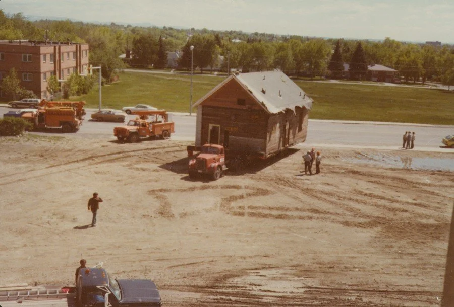 Moving the first schoolhouse, photographer John Staub [1992.066.0077]