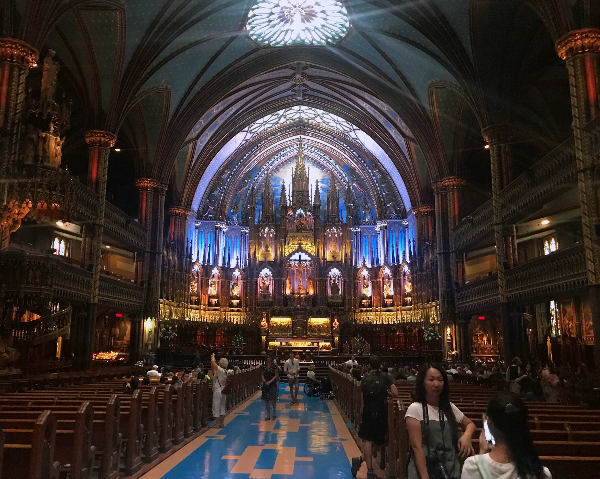 The stunning Notre Dam Cathedral of Montreal is adorned in different shades of blue