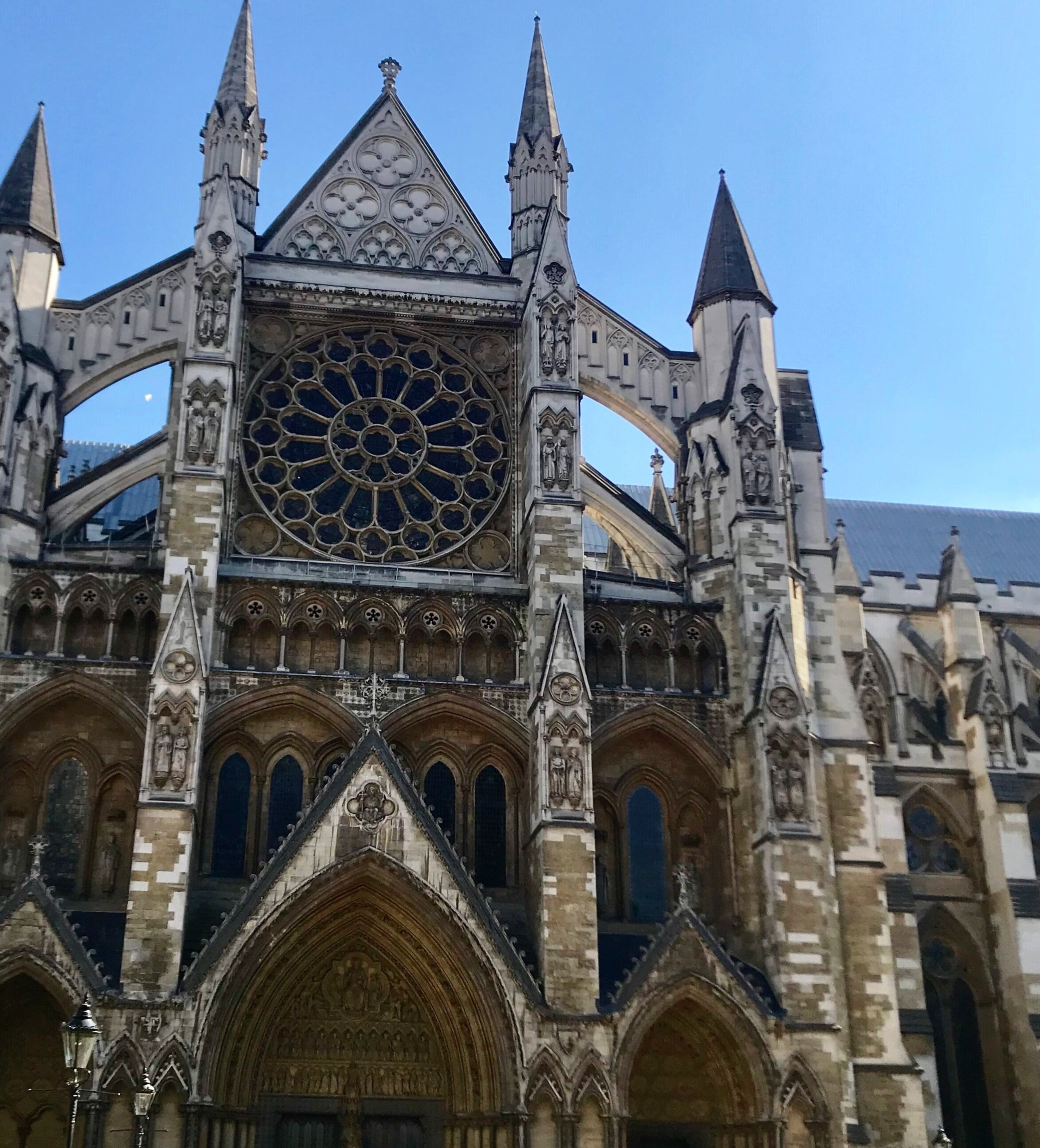 Stop 6: Westminster Abbey  - The current structure of Westminster Abbey and the Westminster Cathedral was built early in the 13th century.  However, a royal abbey has stood on this site since 1066. Since its establishment, it has witnessed all aspects of English history, both positive and negative. Westminster Abbey has hosted EVERY Royal coronation since 1066. Additionally, it has been the venue for multiple extravagant weddings, including that of Prince William and Catherine Middleton in 2011.  Along with royal weddings, it has hosted royal funerals. Including the funeral for Princess Diana. Westminster serves as the final resting place of several former Kings and Queens, as well as that of many notable figures of British society including Geoffrey Chaucer, Isaac Newton, Charles Darwin, and Stephen Hawking. Unfortunately, Westminster has not only witnessed prosperity and fortune, but It has also witnessed some of the darkest times in British history. Like much of London, it suffered major damage in WWII and thus has undergone many improvements and restorations since.