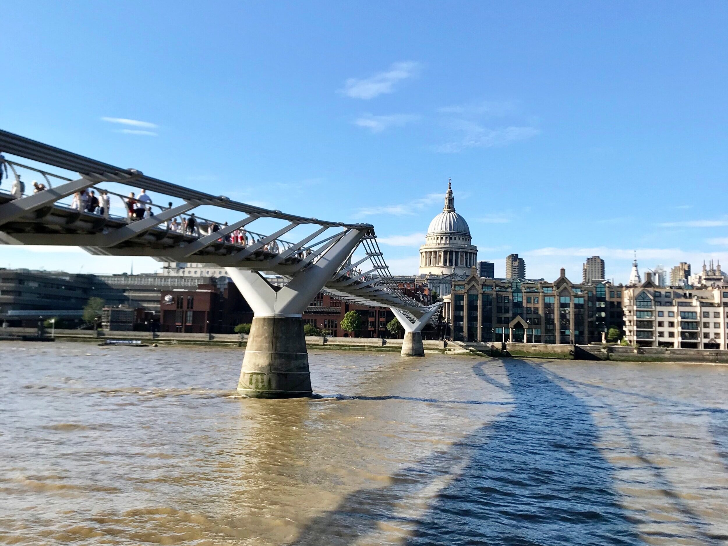 Stop 10: Millennium Bridge  - If you continue past the London Eye along The Queens Walk you will pass several ornate bridges, many cute shops, restaurants, markets, and food trucks that are set up along the river walk.  One of my favorites markets was the Waterloo Book market, which is set up below the base of the Waterloo bridge.  Continue down the Queen’s Walk past two more bridges until you reach the Millennium Bridge. This Bridge directly connects the South shore of the Thames to St. Paul’s Basilica on the North bank. The Bridge was also used as a filming location for “Harry Potter”. St. Paul’s Basilica was built after the Great Fire of London in the 17th Century and boasts one of the highest domes in the world. 