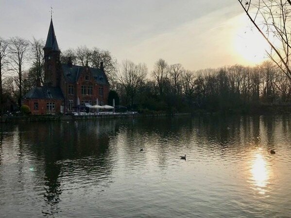 Tranquil mornings at Minnewater lake. Take in the romantic peaks and quiet energy of Brugges. 