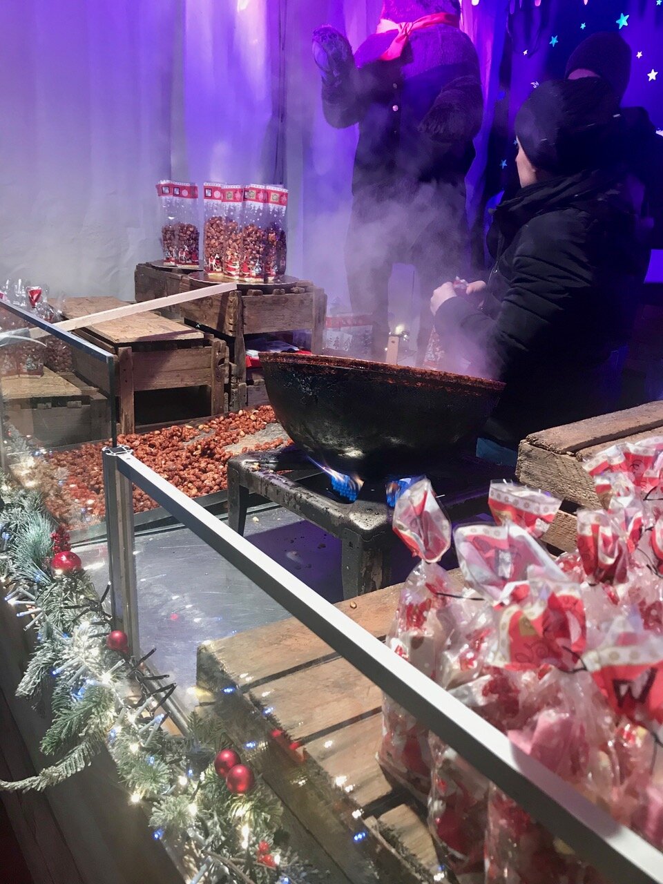 Chestnuts and Almonds roasting on an open fire at a Christmas Market in Belgium. You can almost see the aromas in the cold air. 