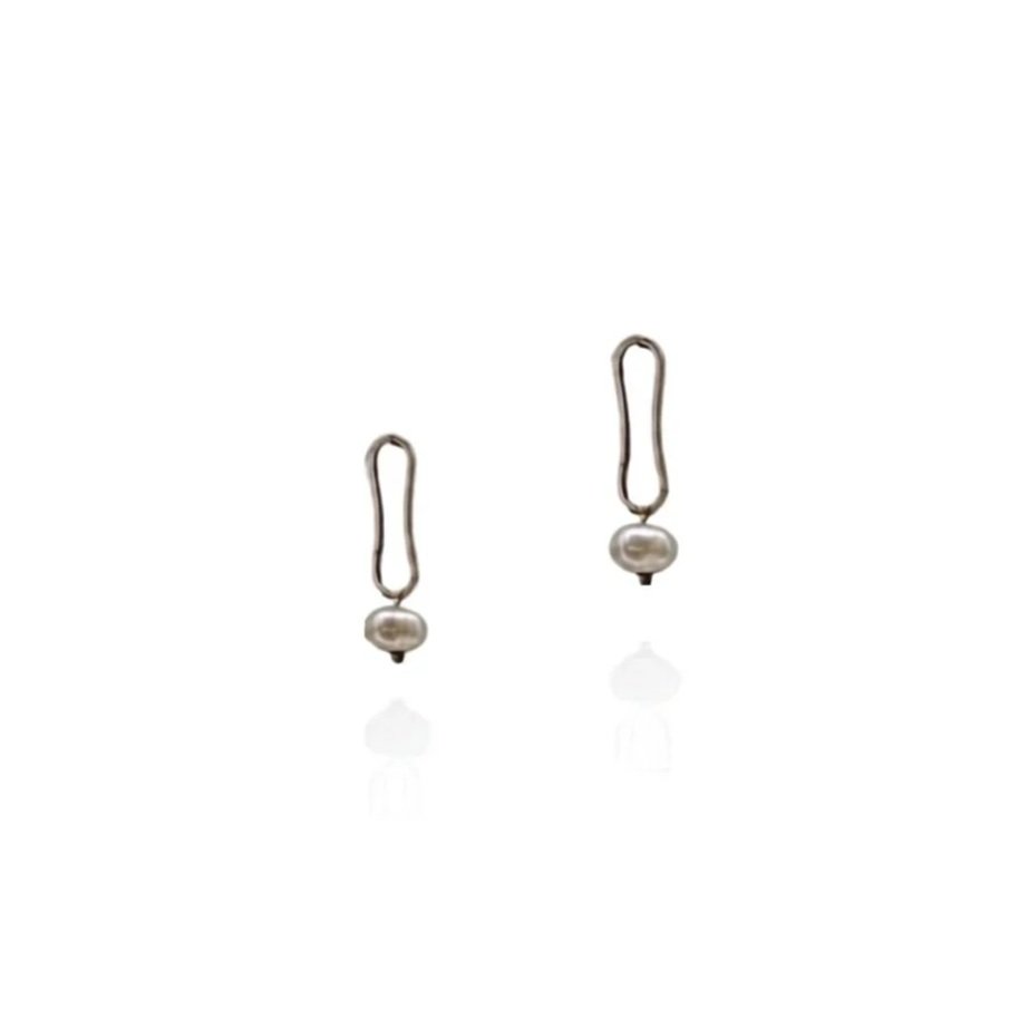 Petite link earrings in sterling silver with a tiny pearl on a white background
