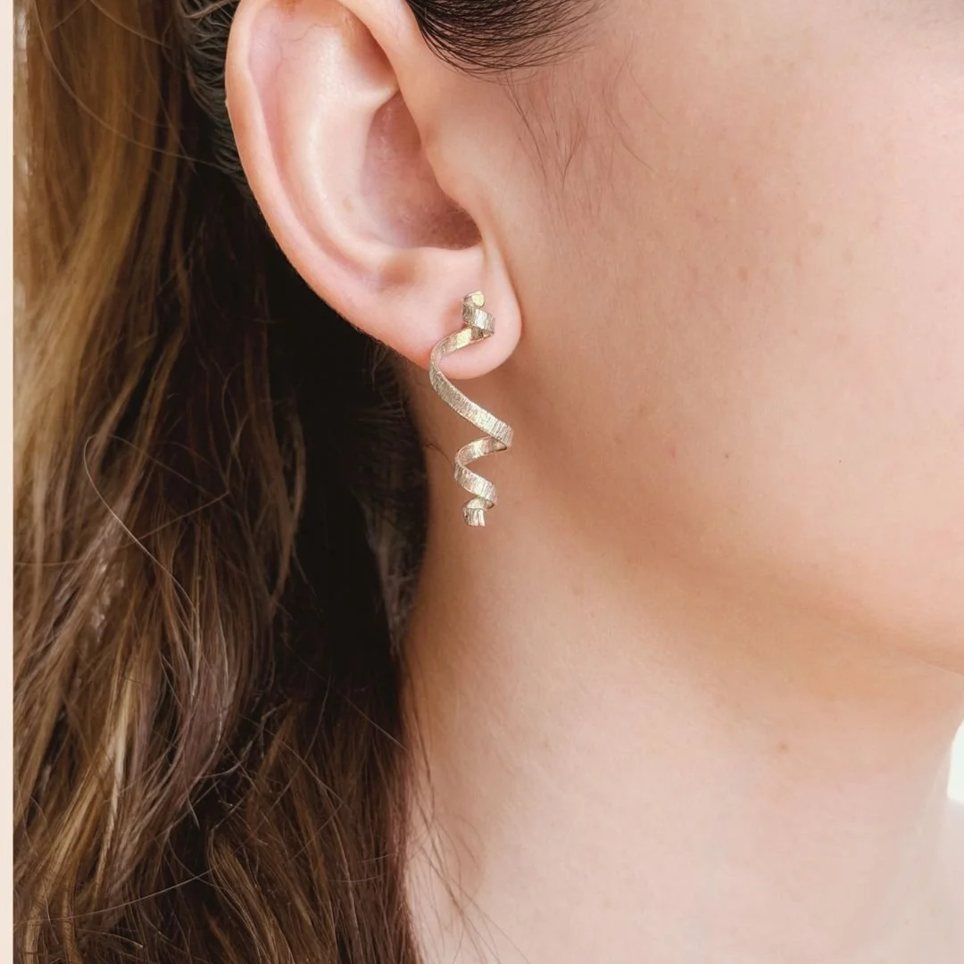 Unfolded Spiral Earrings in Sterling Silver - Worn.jpg