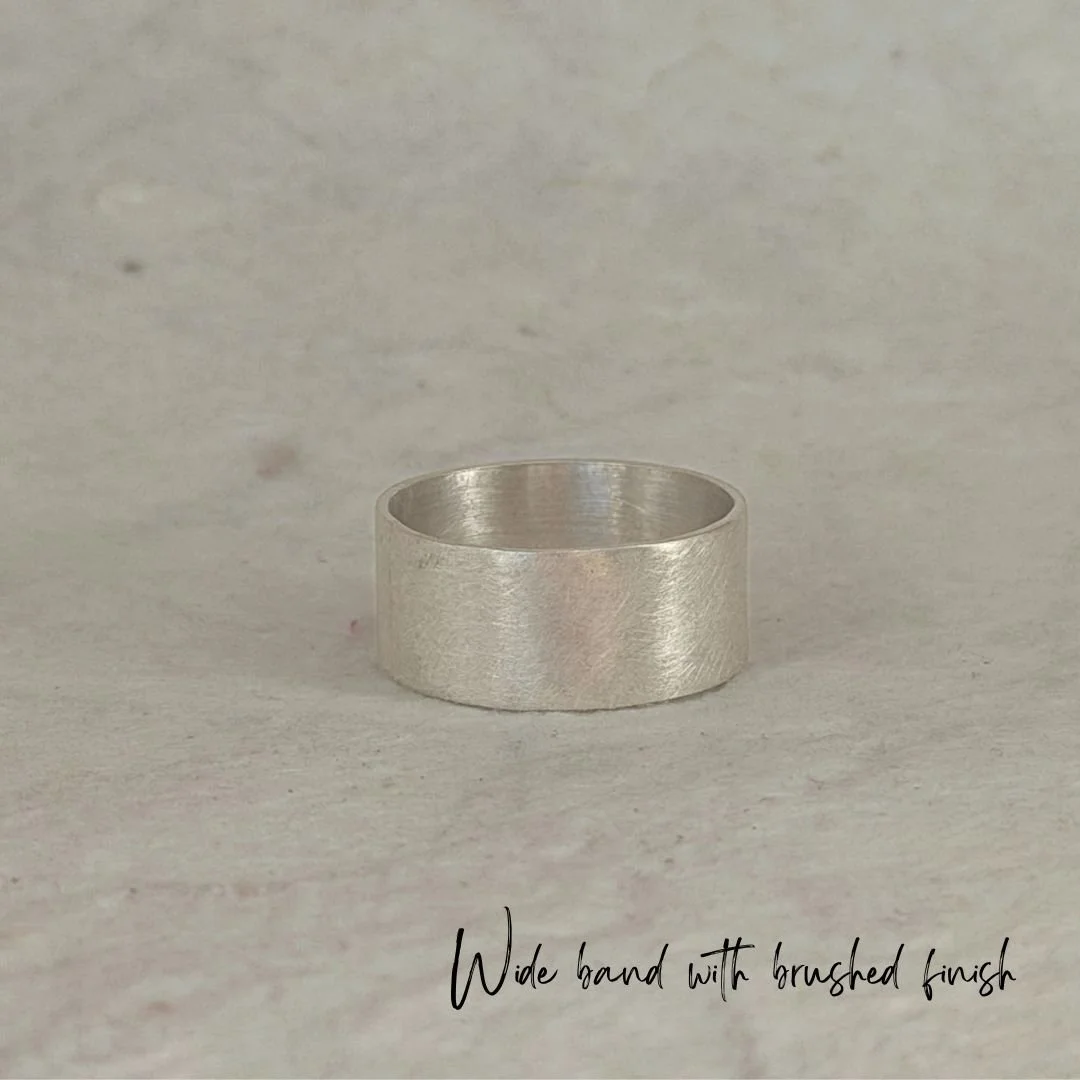 Wide band with Textured finish on a neutral background.jpg