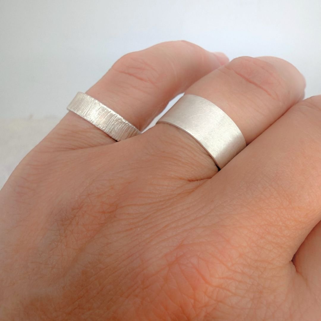Wide & Narrow band Silver ring worn.jpg