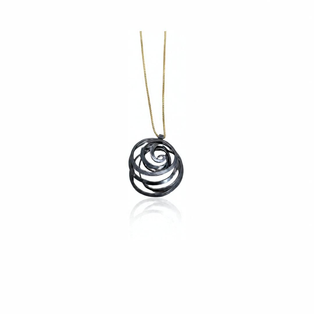 Freeform Spiral Necklace in oxidized sterling silver on a gold-filled chain, shown against a white background.