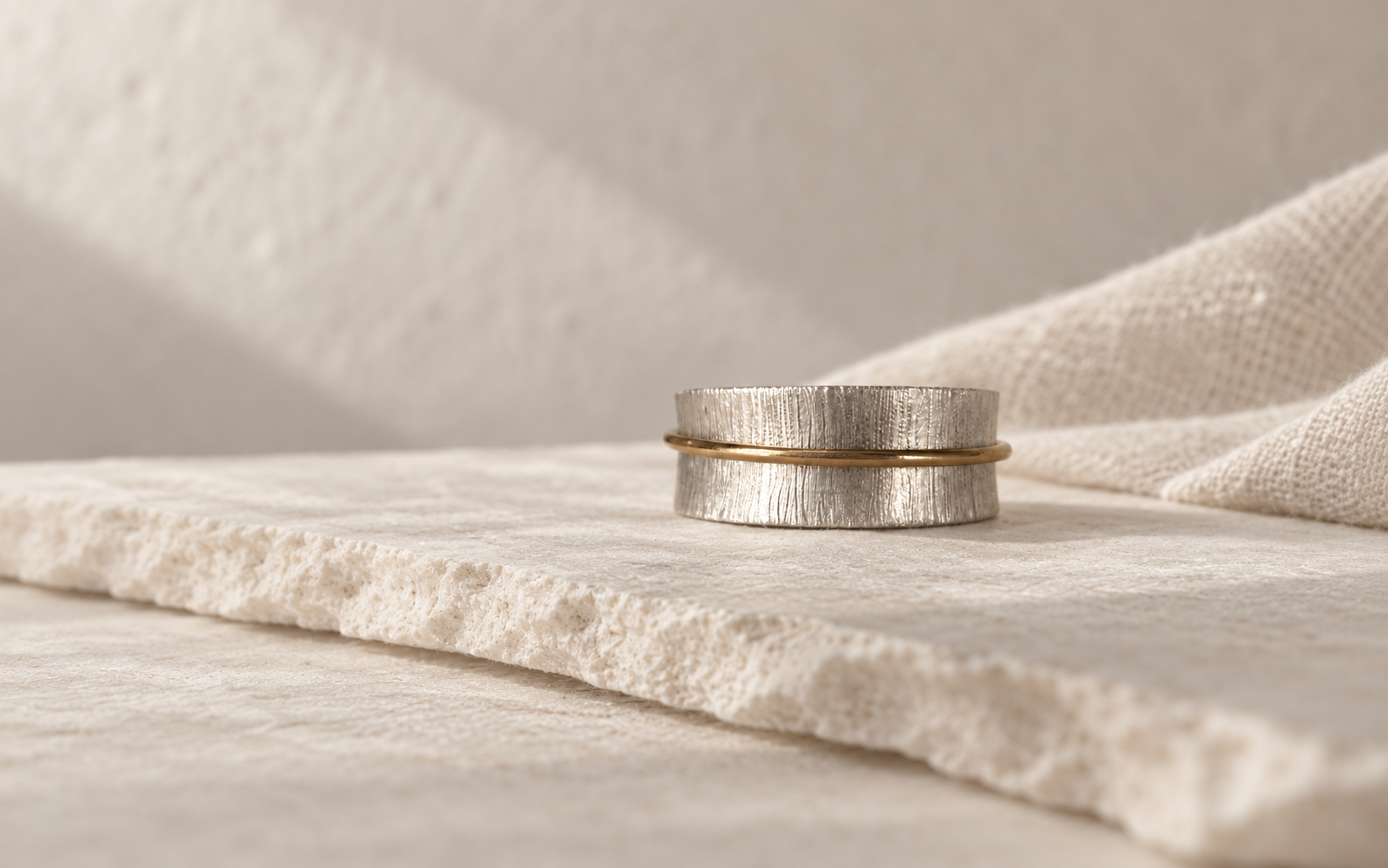 Textured Ring with Sterling Silver and Gold on a stone