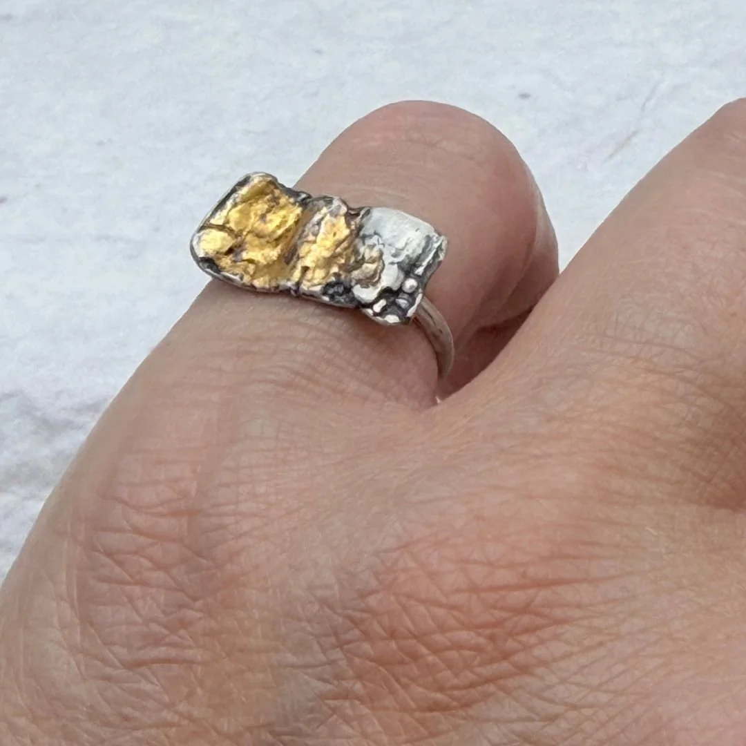 Petite Textured Ring worn on a finger, showing its textured sterling silver surface and keum-boo gold