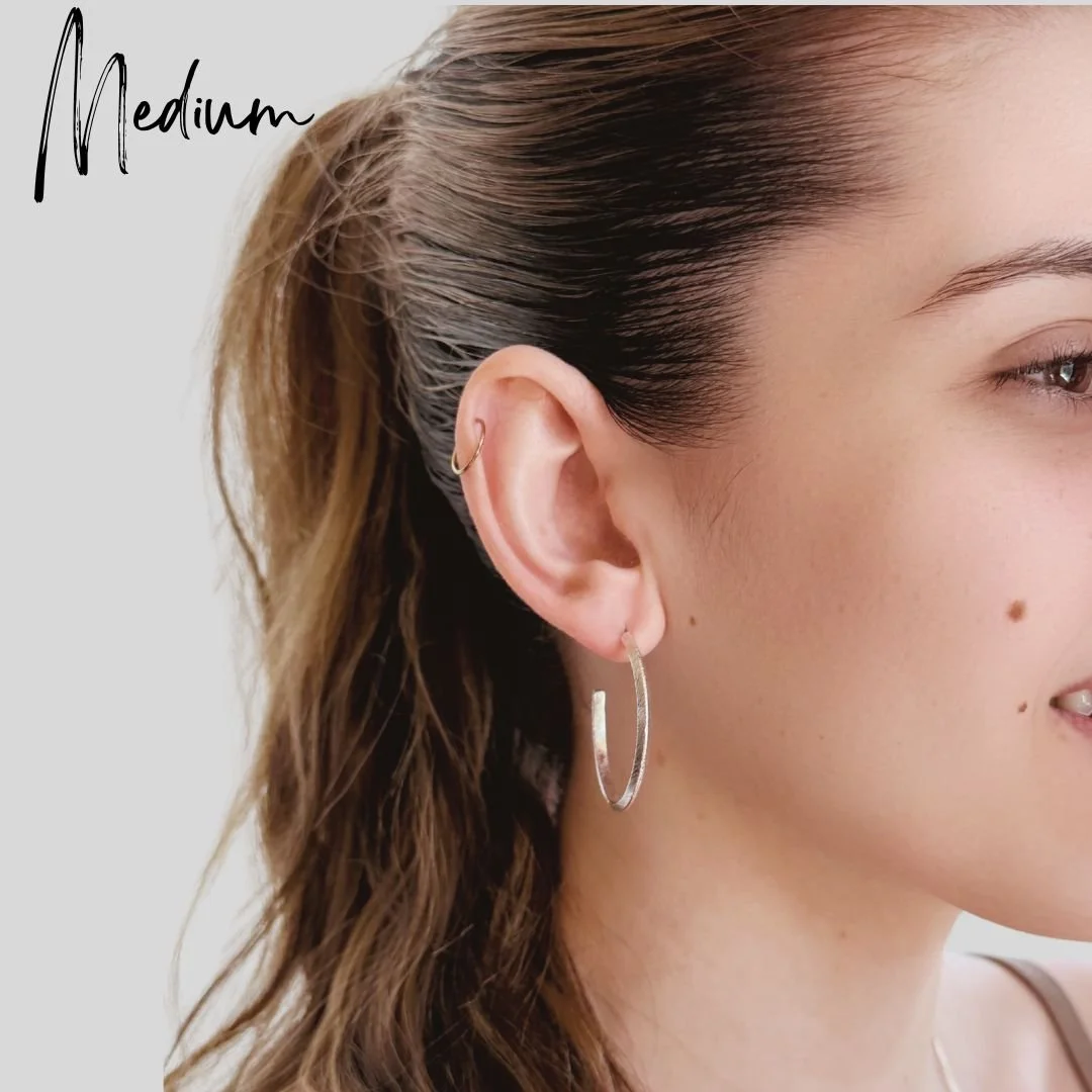 Medium Size Textured Hoops Worn.jpg
