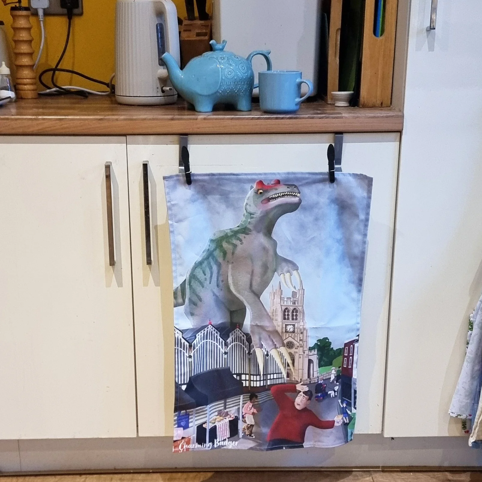 Stockport market dino - cotton tea towel