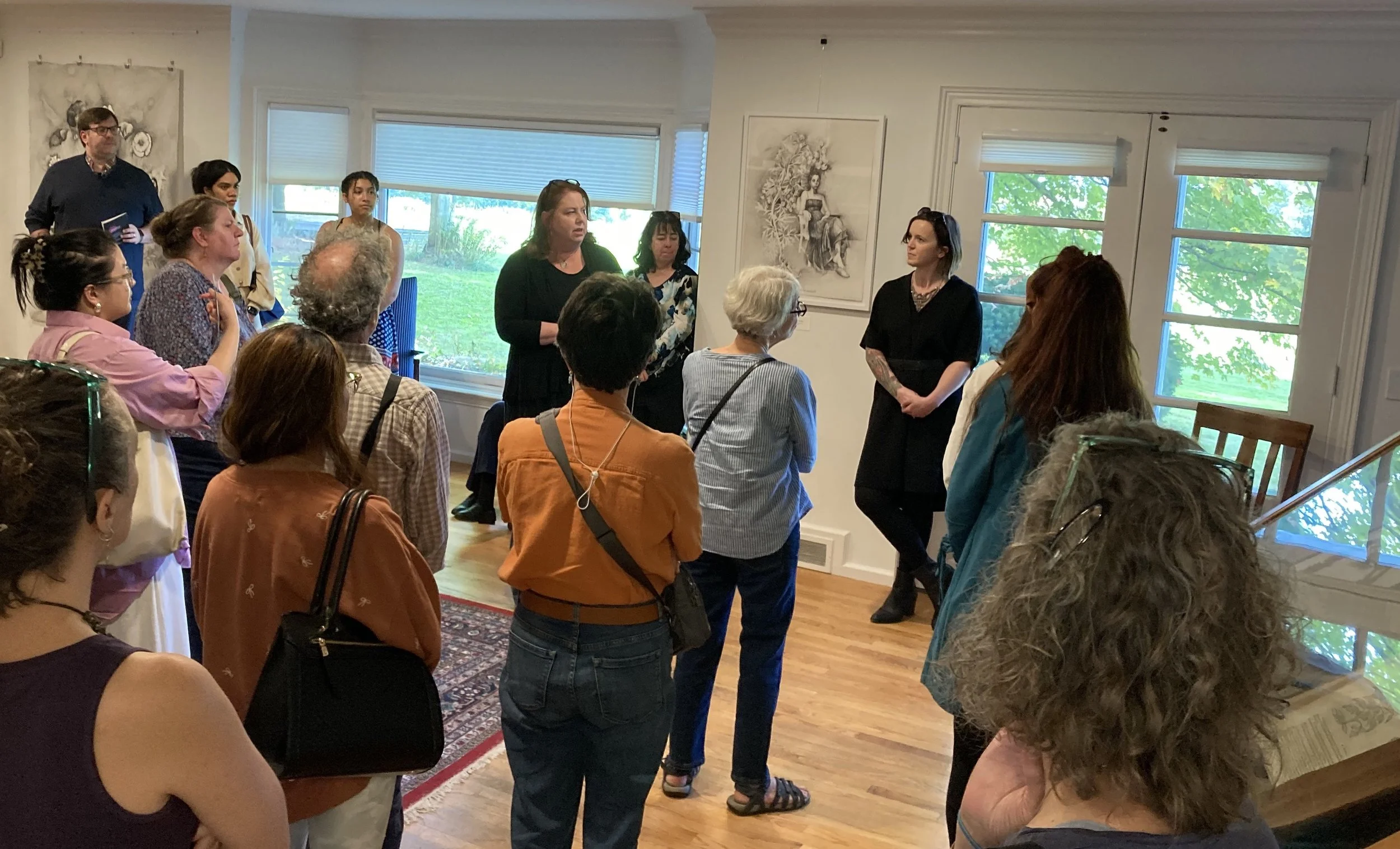  Original artworks are displayed alongside the books that inspired them  in the reading room. Visitors to the exhibit opening for  Fatal Flora   meet artist Susan Montgomery and learn more about her work. 