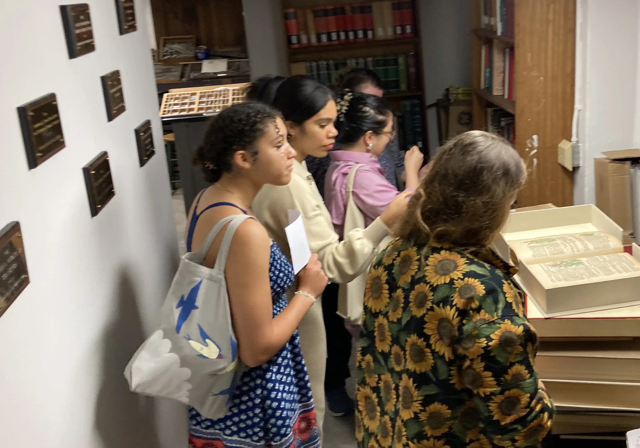  Students attending the opening of  Fatal Flora  engage with a variety of rare material available in the Center’s collection. 