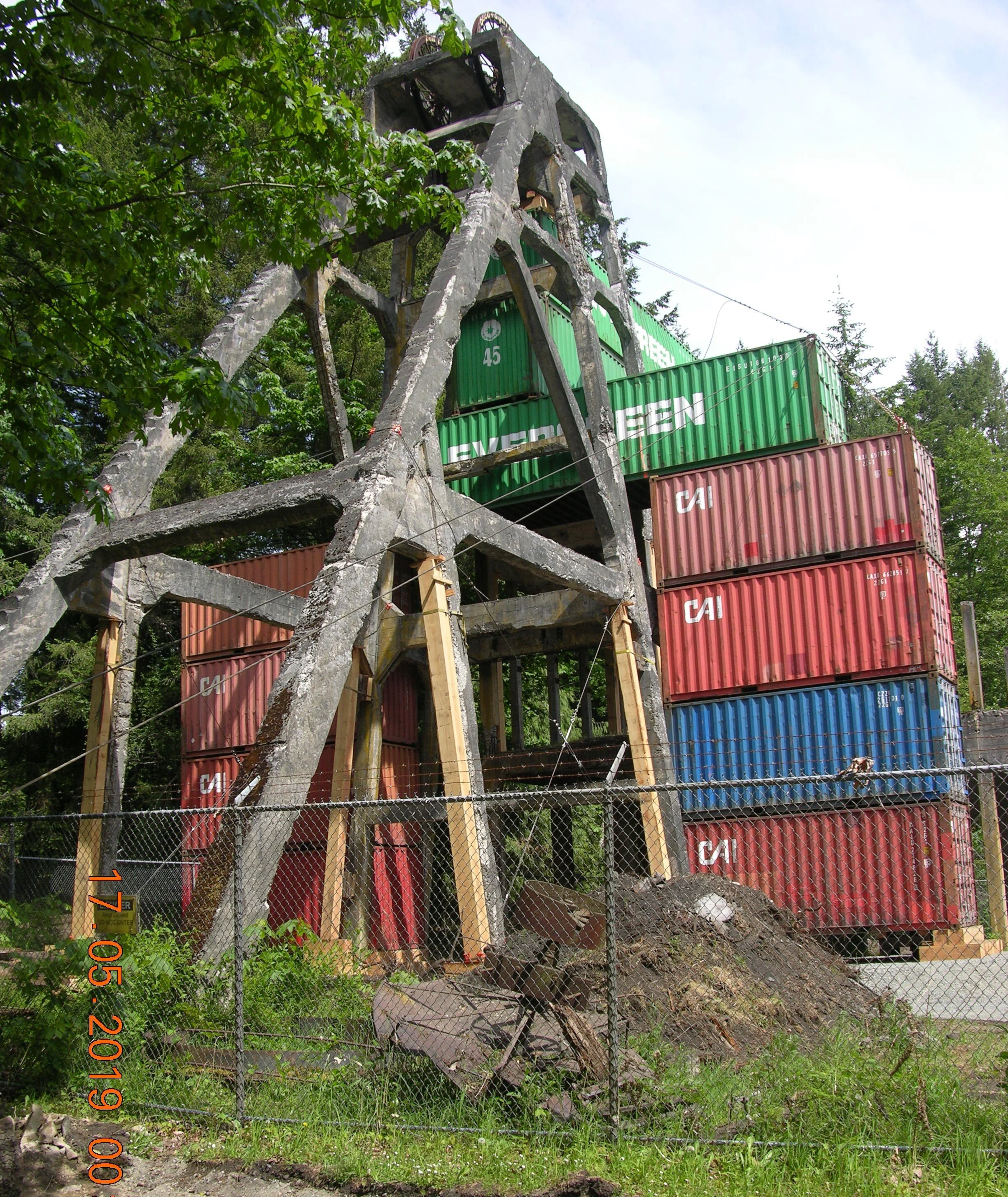 Morden as it looked during rehabilitation—supported by shipping containers.