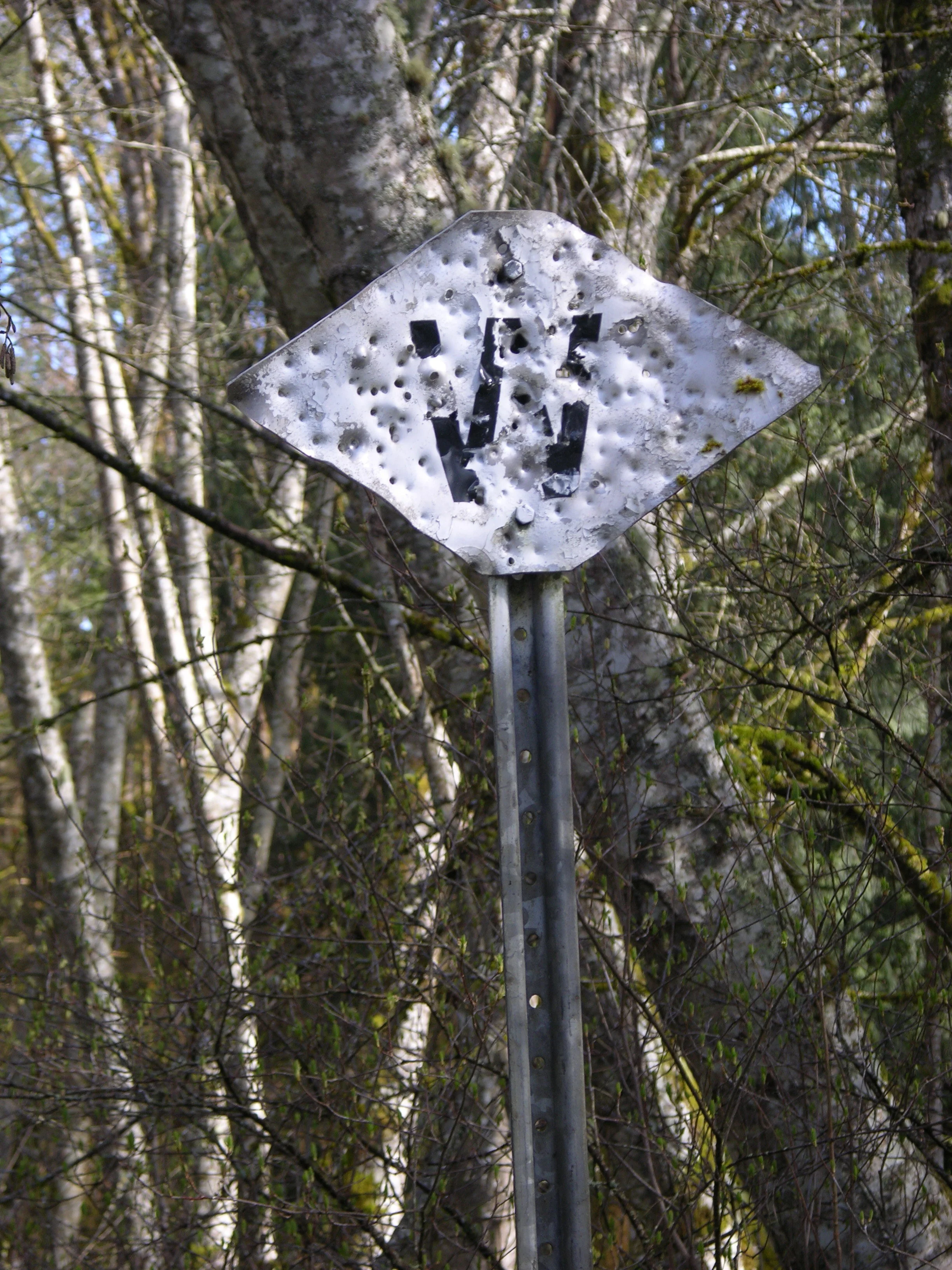 A whistle post; note the bullet holes.