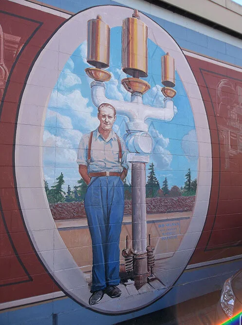 The Bob Swanson mural in Chemainus. Notice the working clothes—a former business partner marvelled in later years that he’d never–not once–seen Swanson not wearing a tie.