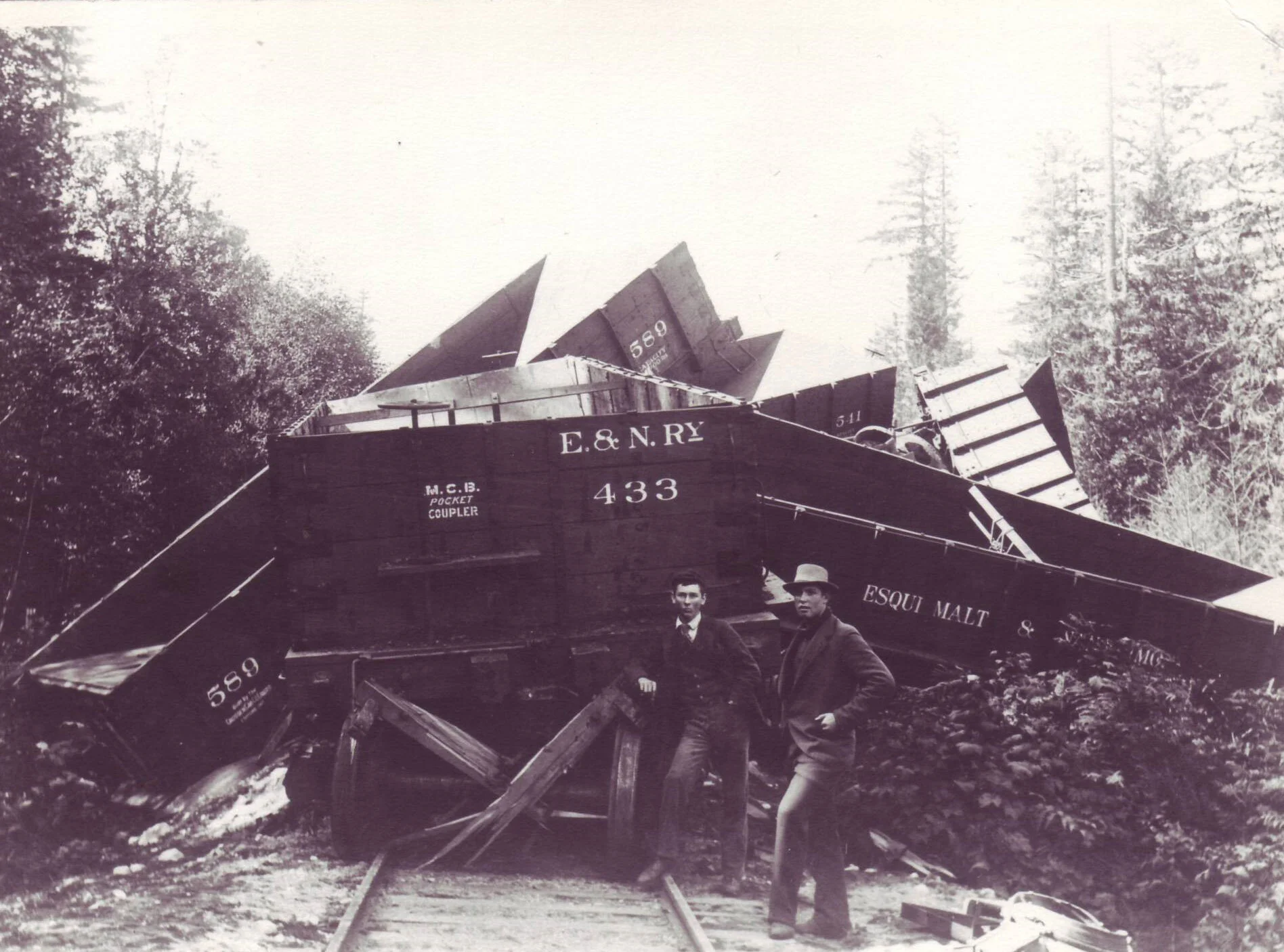 Two graphic views of the wreckage of the No.’s 1 and 10. From Victoria and Nanaimo, special excursion trains were pressed into service to carry curiosity seekers to the disaster scene.—Bob Dougan photos