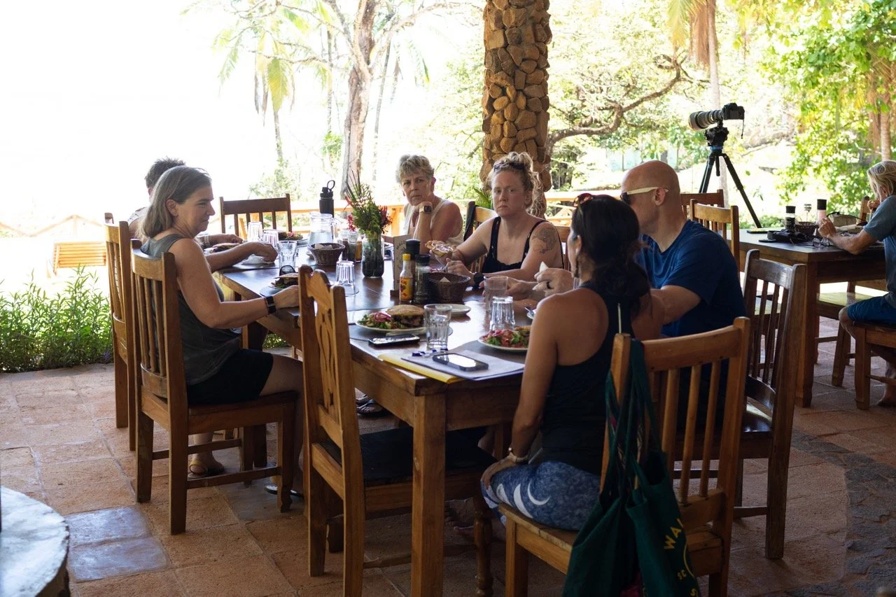 guests from all over conversing at lunch