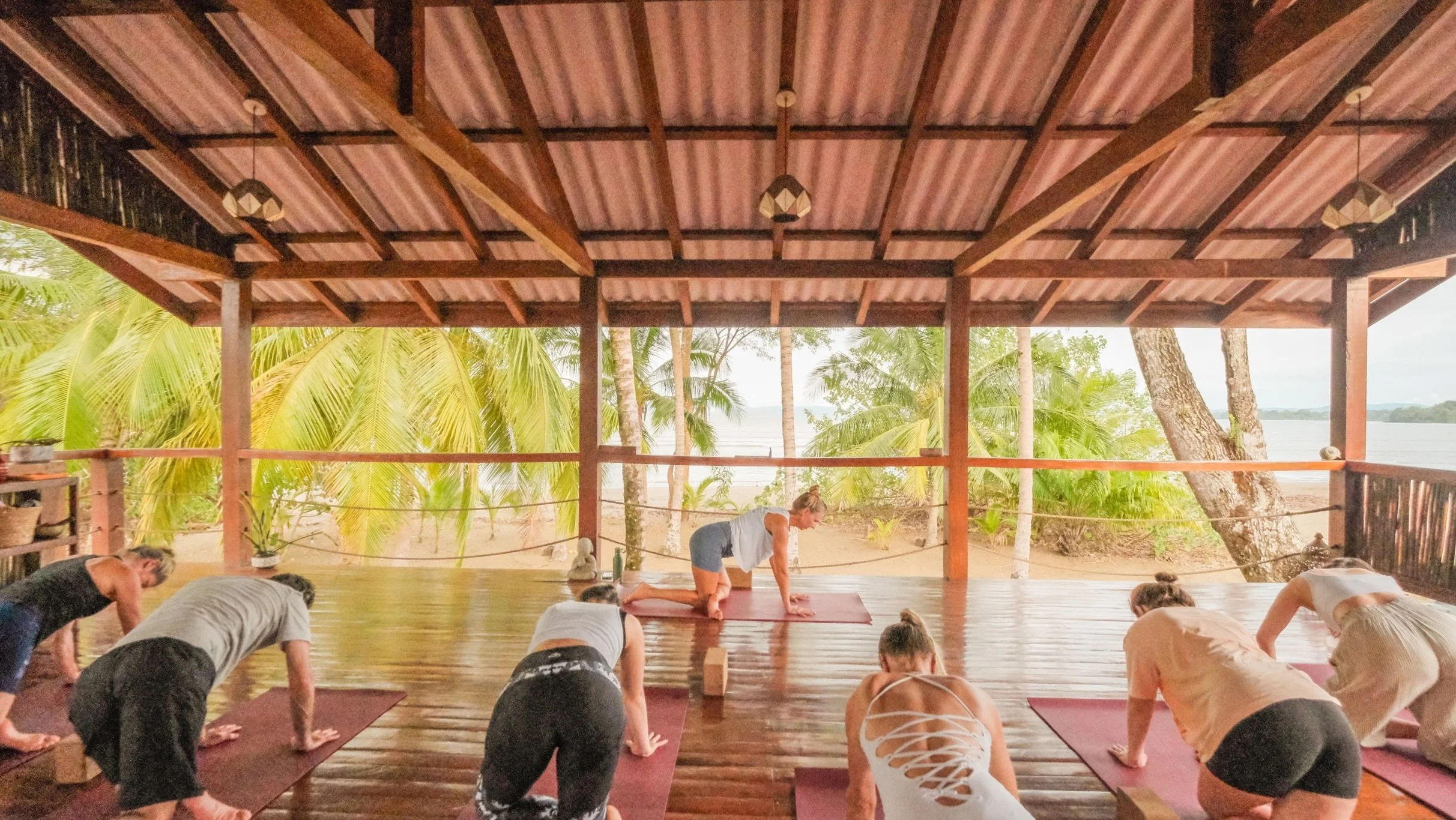 A Day in the Life at a Yoga and Surf Retreat in Panama: What to Expect at Waluaa 6 yoga class at our luxe beachfront location