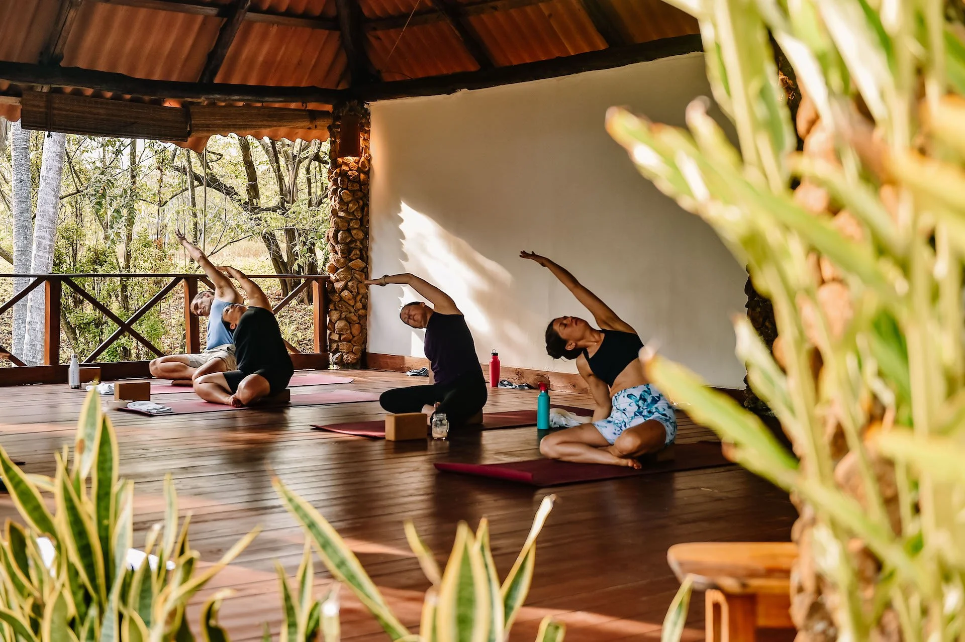 10 Years of Waluaa: Our Story, Our Soul, and Our Surf in Panama 4 Side+Stretch+Yoga+Class+at+Waluaa