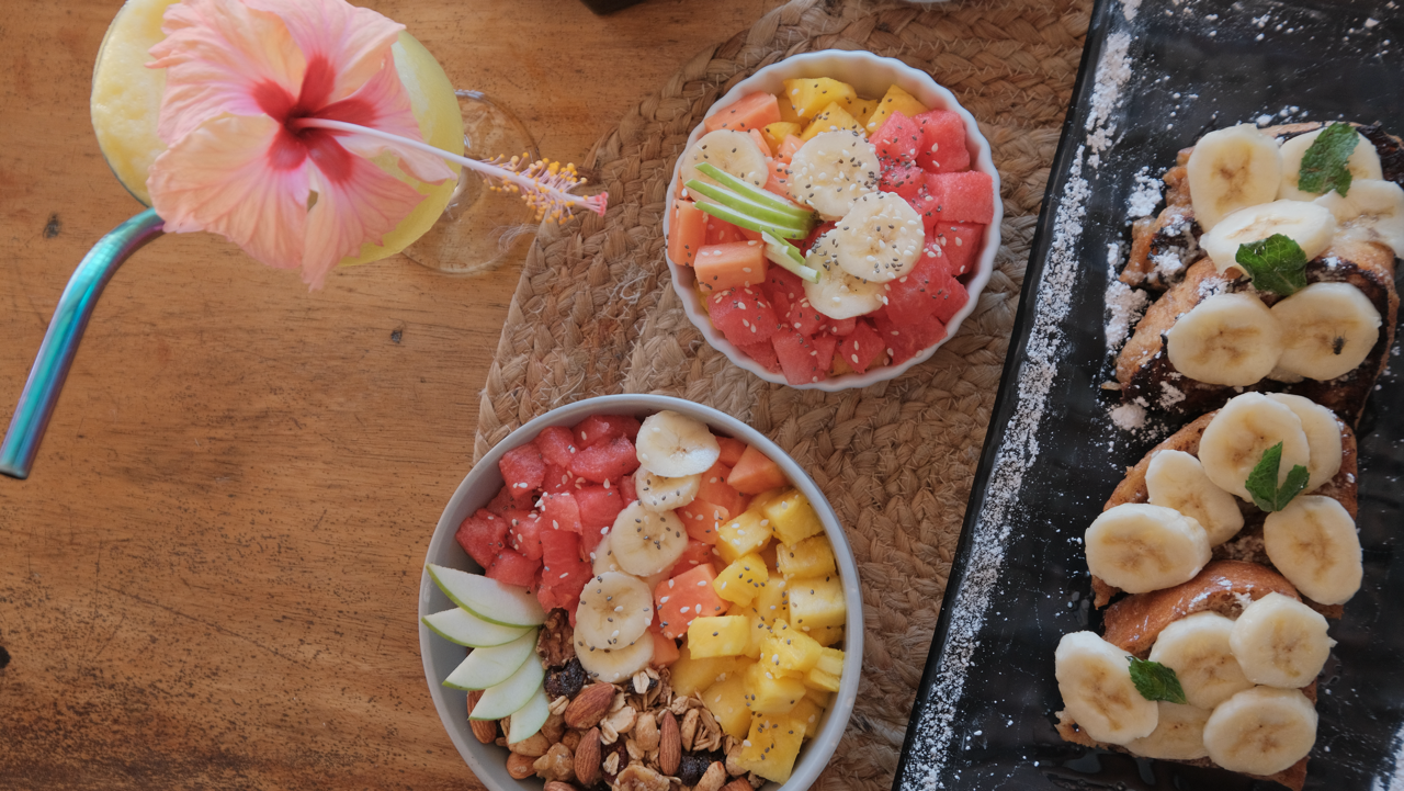 fruit and yoga bowl, french toast and a smoothie for breakfast at our wellness retreat in Panama