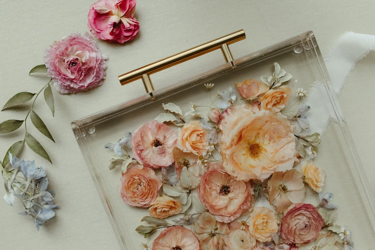 Layers of pink florals, hints of blue, and pops of greenery tucked all around. 

This tray and bookend were created to feel like a love story you can display&mdash; delicate, romantic, and effortlessly functional. 

For a home that loves beauty in de