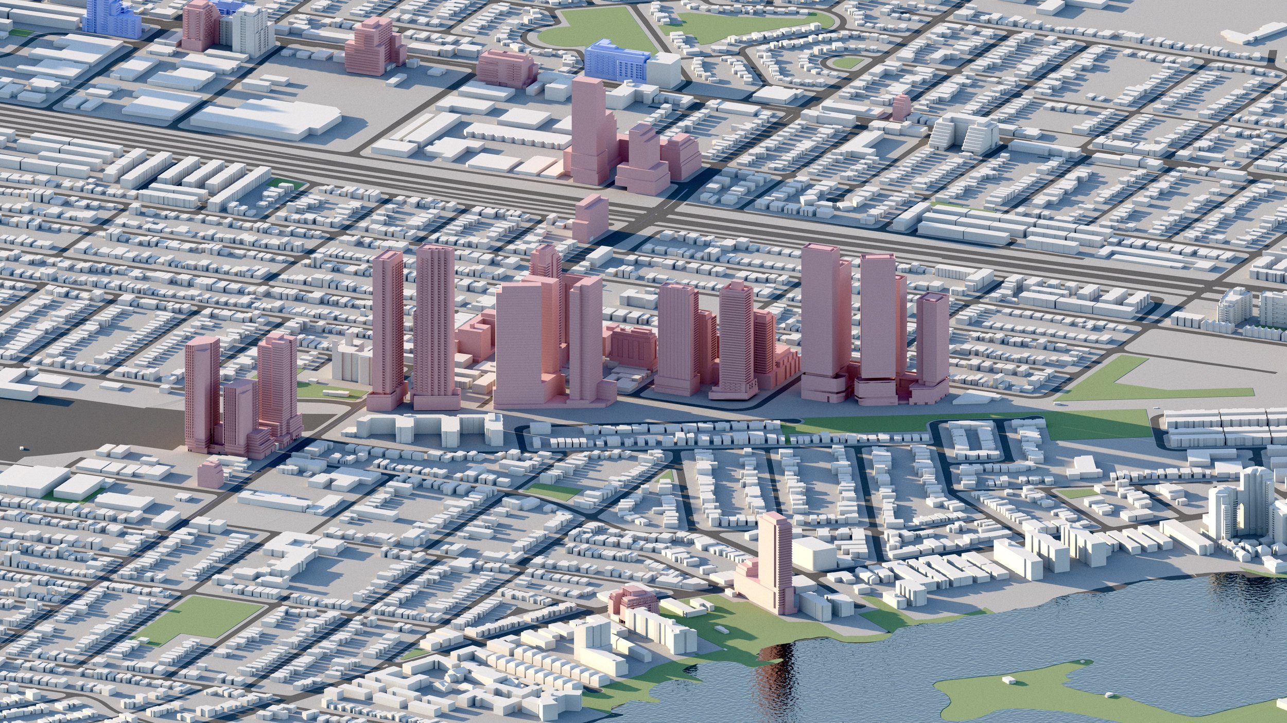 Aerial view of a cityscape with high-rise buildings, residential areas, and a body of water in the foreground. The city features a mix of tall skyscrapers and lower structures, with roads and green spaces visible.