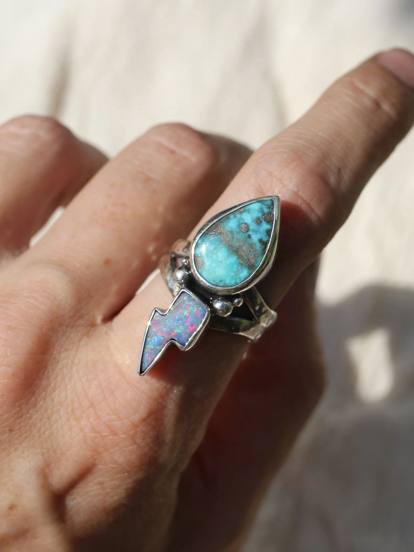 She&rsquo;s electric!!! ⚡️

Omg I need more lightning bolts just to make more of this design! I am IN LOVE!!!! 

Swipe to see a close up of this insane Aussie opal (and a little polish residue!!) Don&rsquo;t worry, I&rsquo;ll clean her up before I ad