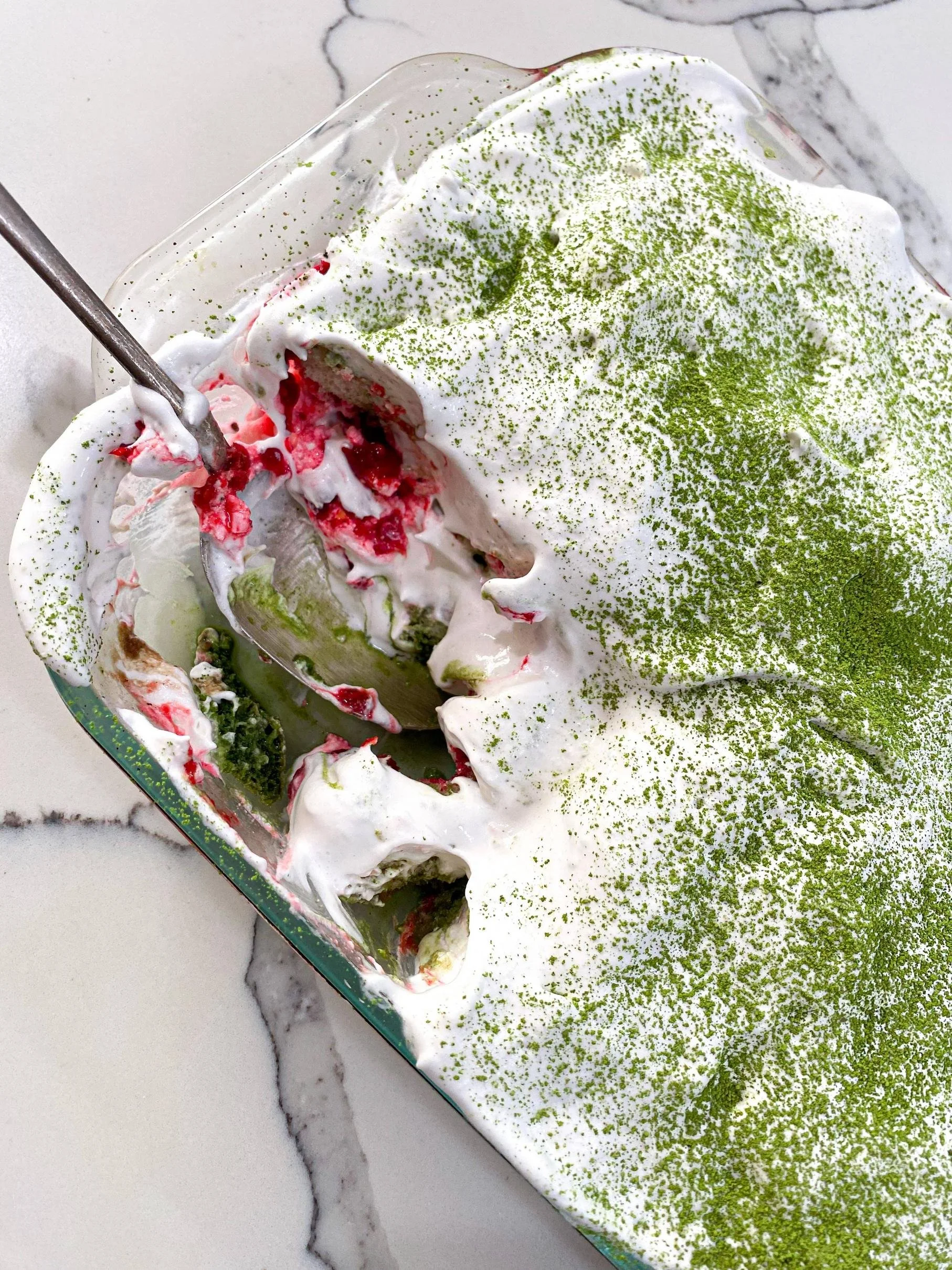 Photo of a dessert called Raspberry Ginger and Matcha Icebox contained in a glass ceramic