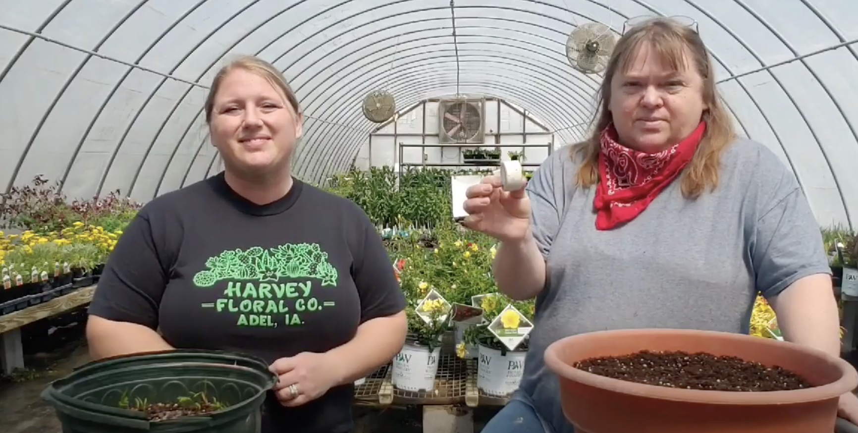 Deb and Val in the Greenhouse showing us how to plant carrots