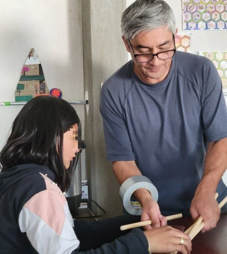 After learning a bit about Argentina, the kids made shoebox foosball games
