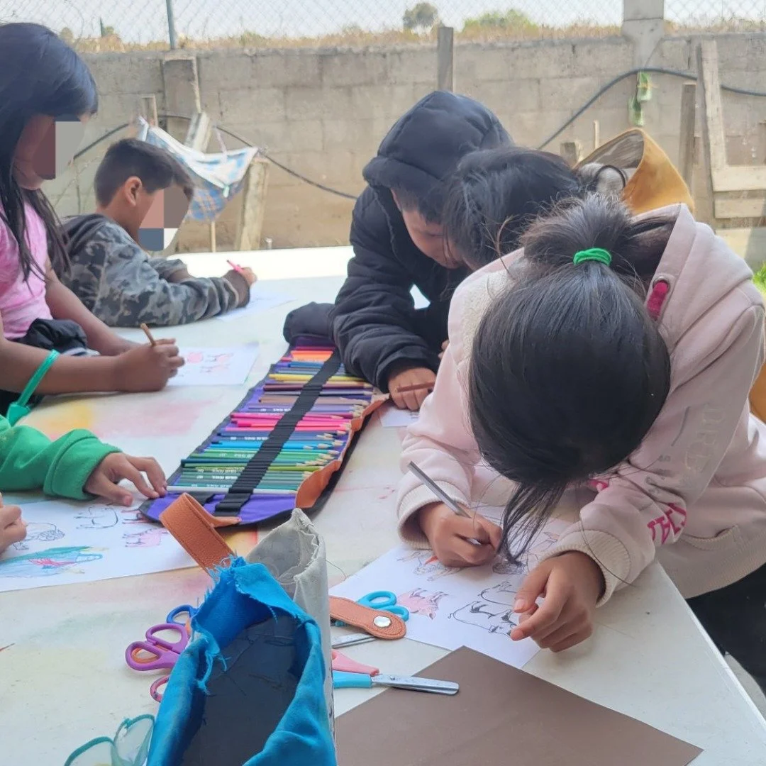 The younger kids doing their Sunday school crafts after everyone heard the story of Matthew 8 in church.
