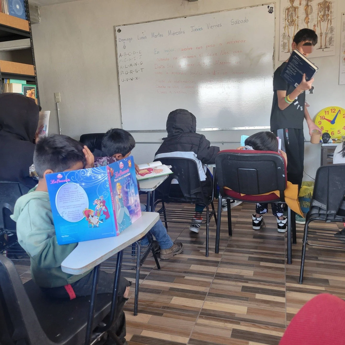 During reading time at school,  the majority of the kids chose books I purchased for incredible prices from the friends' bookstore while in the States last week.