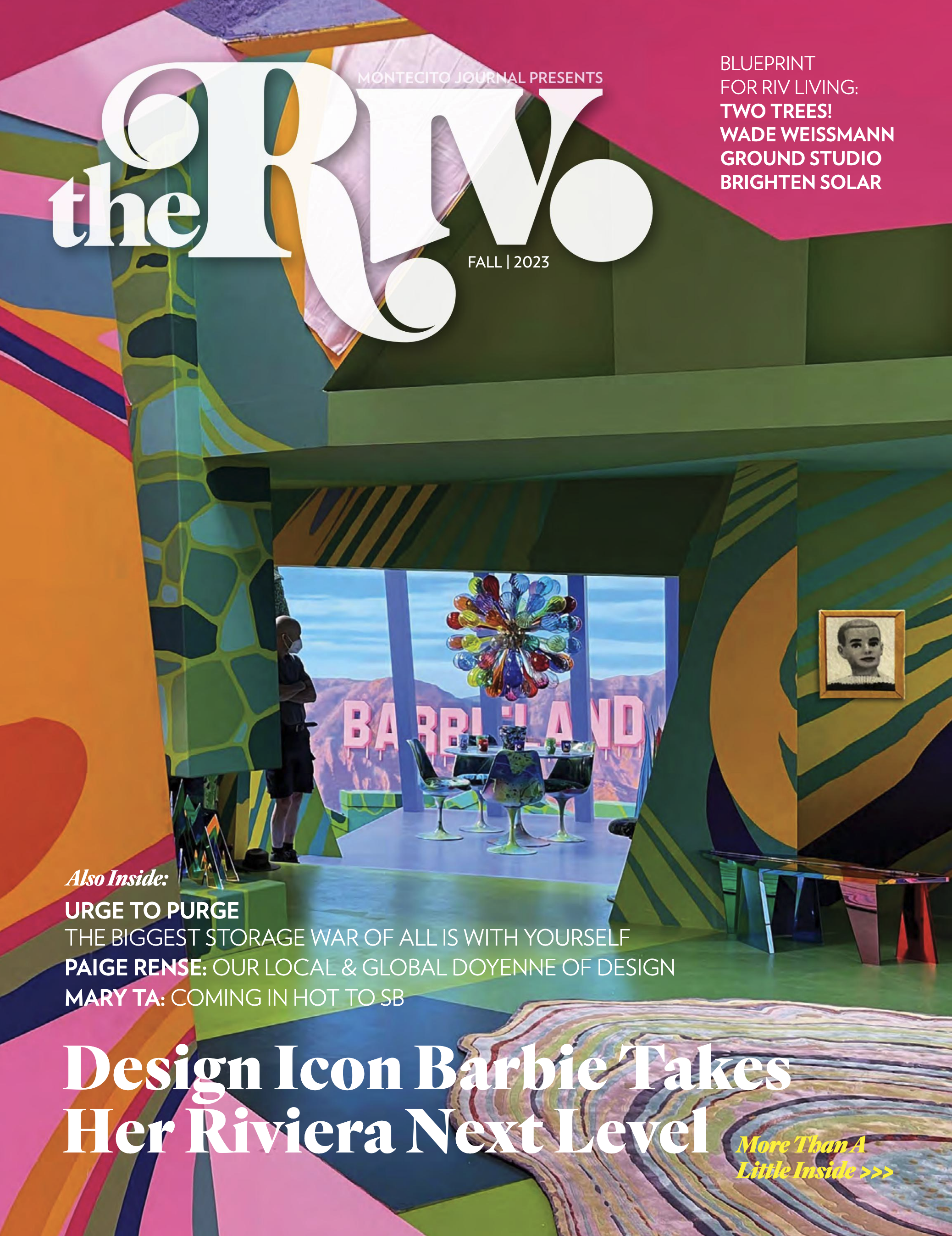 Colorful, vibrant interior art installation with geometric shapes, a multicolored chandelier, modern chairs around a table, a mountain view in the background, a person standing in the space, and framed artwork on the wall. The space features bold, bright walls with patterns and painted murals, creating a lively atmosphere for a magazine cover.