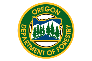 Oregon Department of Forestry Logo - green and yellow shield with state of Oregon outlined