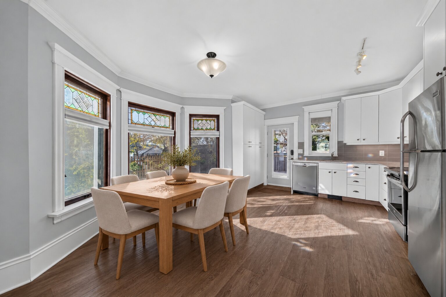 Oak Dining Set Beside Bay Windows.jpg