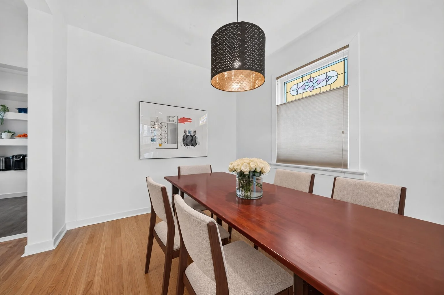 Dining chairs around a wood table.jpg