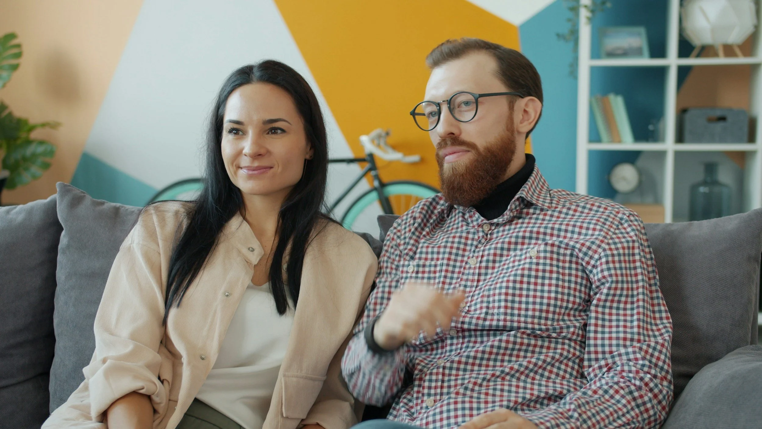 Couple sitting closely during a therapy session showing reconnection