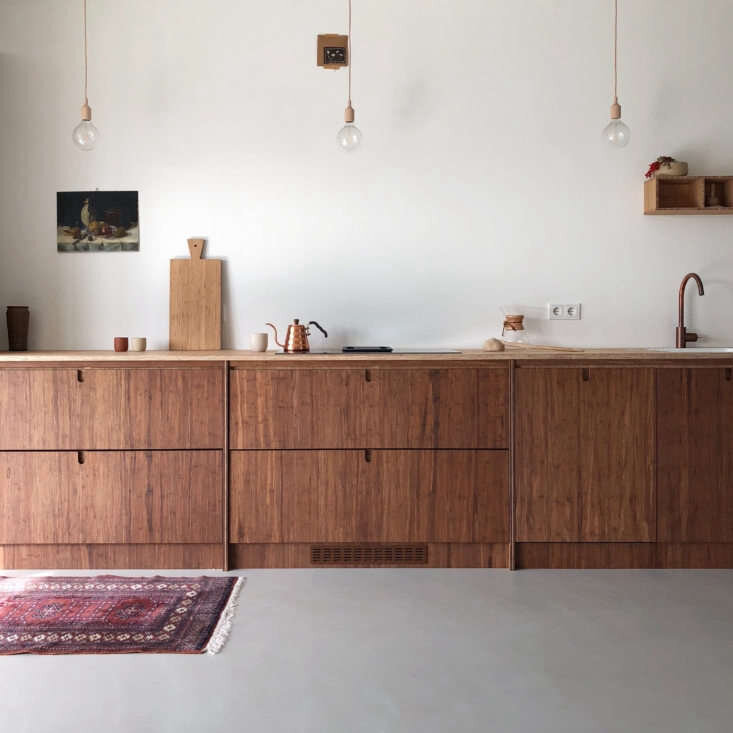 Dark Bamboo Kitchen cabinetry designed by Ask Og Eng for Remodelista