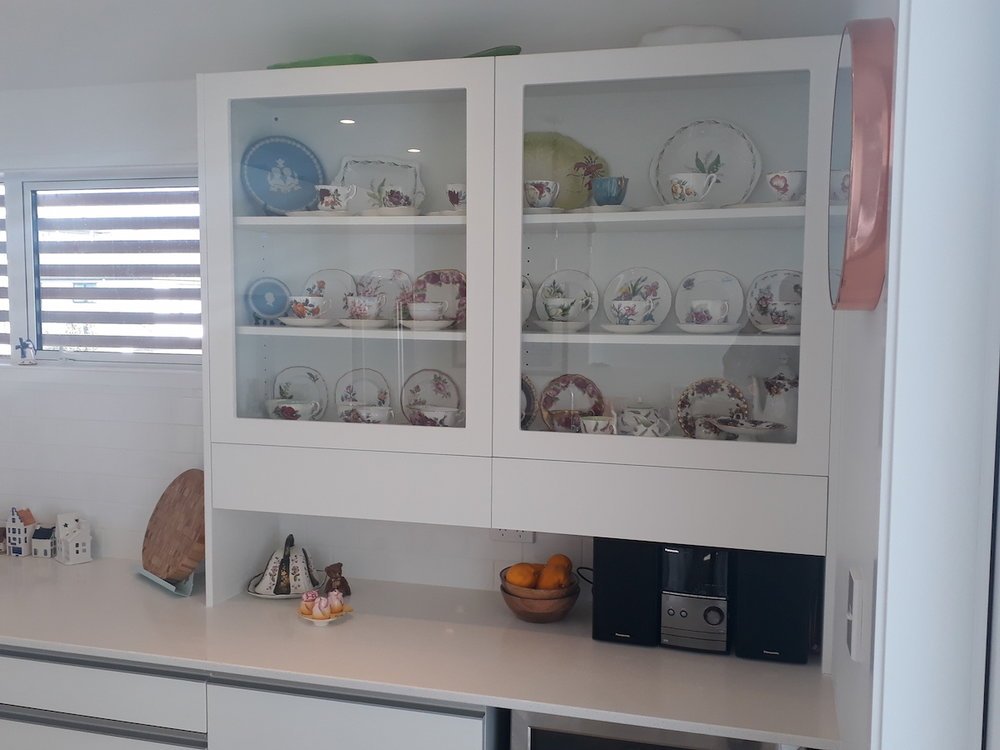 Glass fronted kitchen cabinet