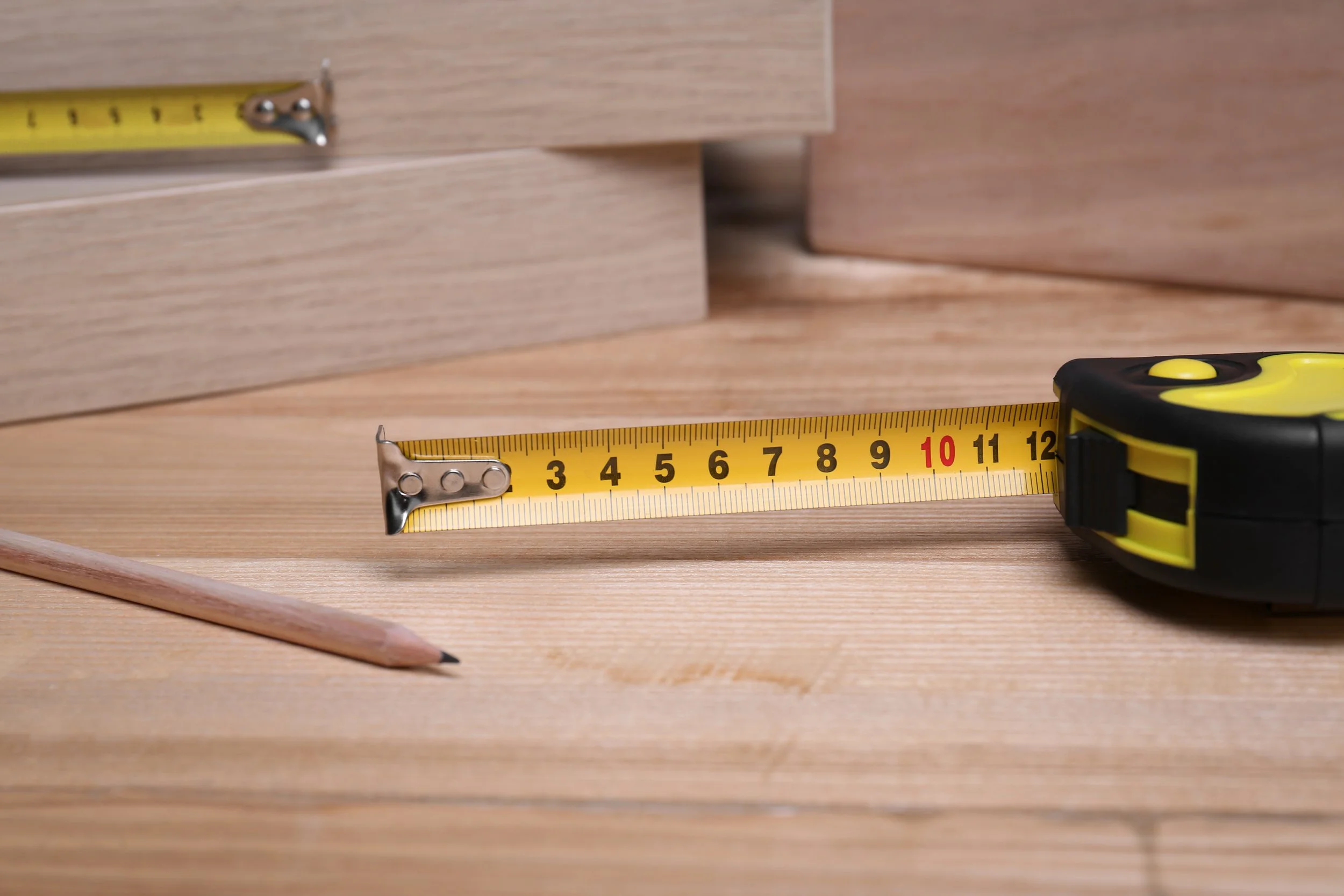 Tape measure and pencil