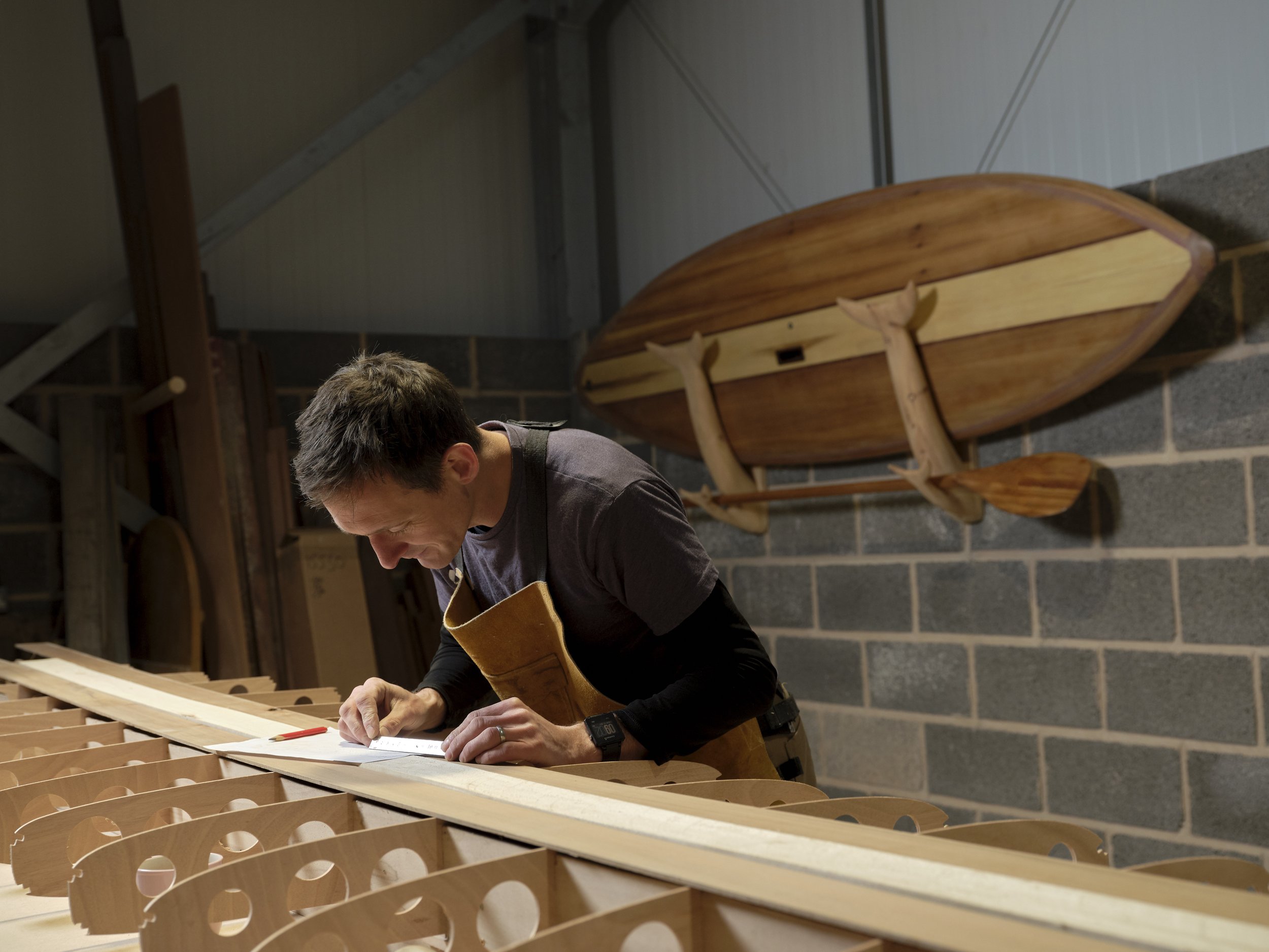 Building a surfboard using CNC cut materials.