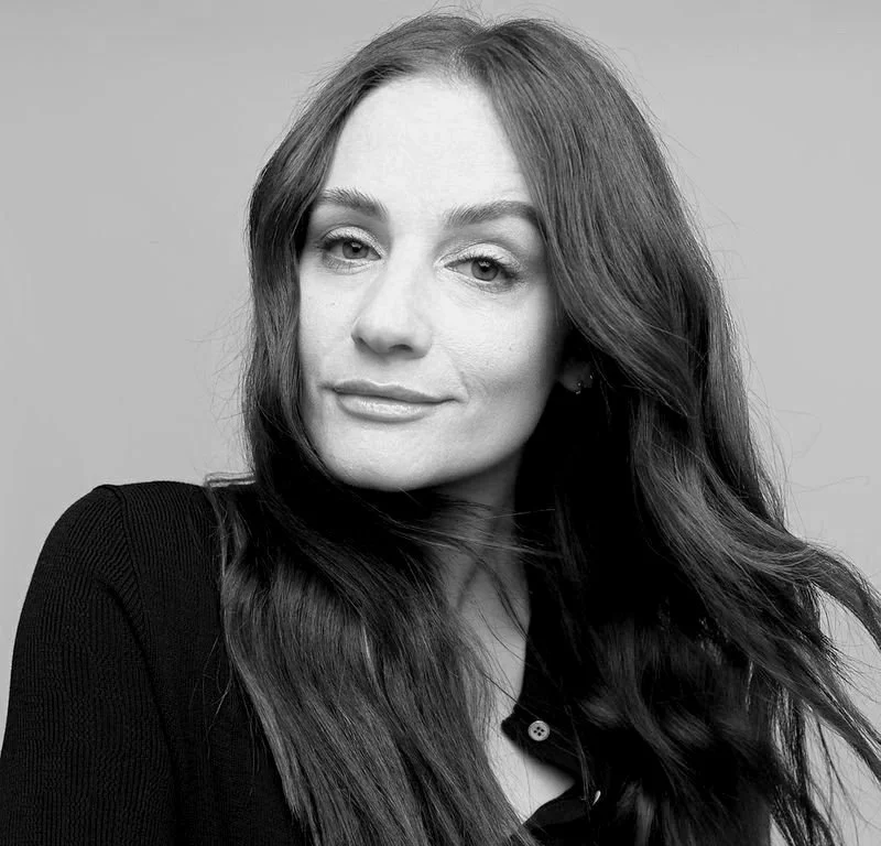 Black and white portrait of a woman with long hair