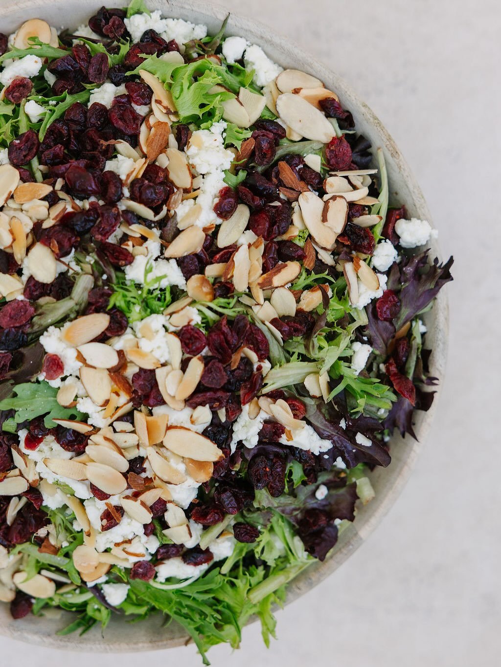 Every Thanksgiving table needs something fresh to complete the plate 🥗

TMCs Cranberry Mixed Greens Salad is a simple crowd-pleaser that adds a satisfying crunch to any Thanksgiving spread. It includes a base of mixed greens and is topped with dried