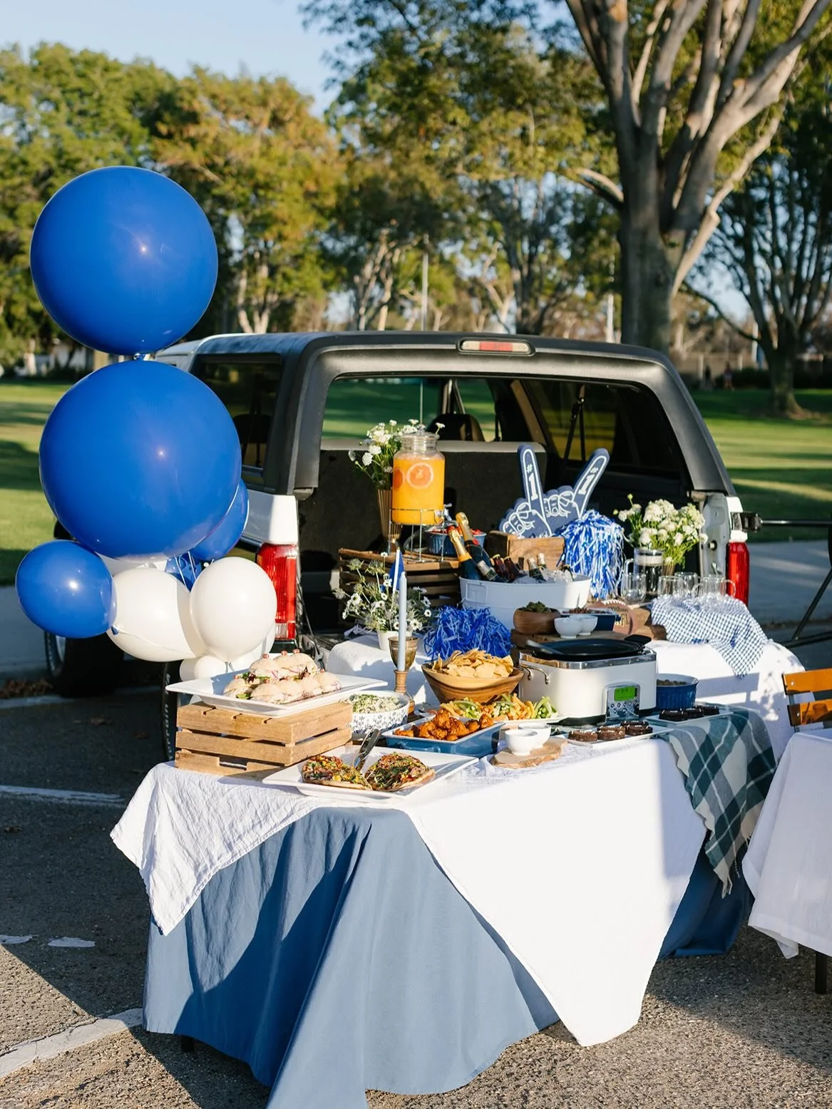 2026 coming in hot with this tailgate spread fit for any football fan! 

This spread featured buffalo wings with veggie dippers, potato salad, our Super Bowl bbq pork flatbread, a build your own nacho station and super cute football brownies! 

We ar
