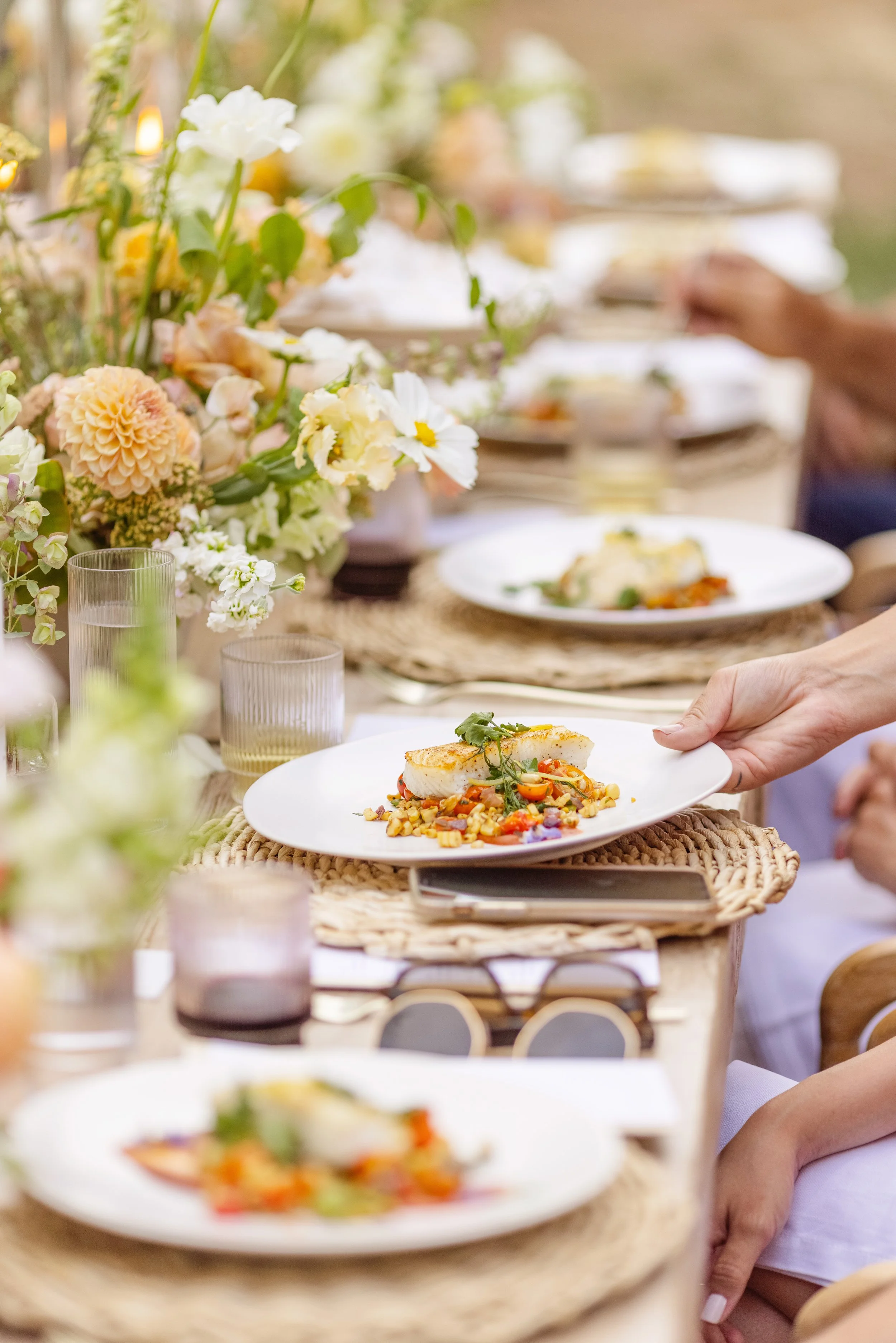 Elegant plated catering served at a wedding reception by Taylor Made Cuisine