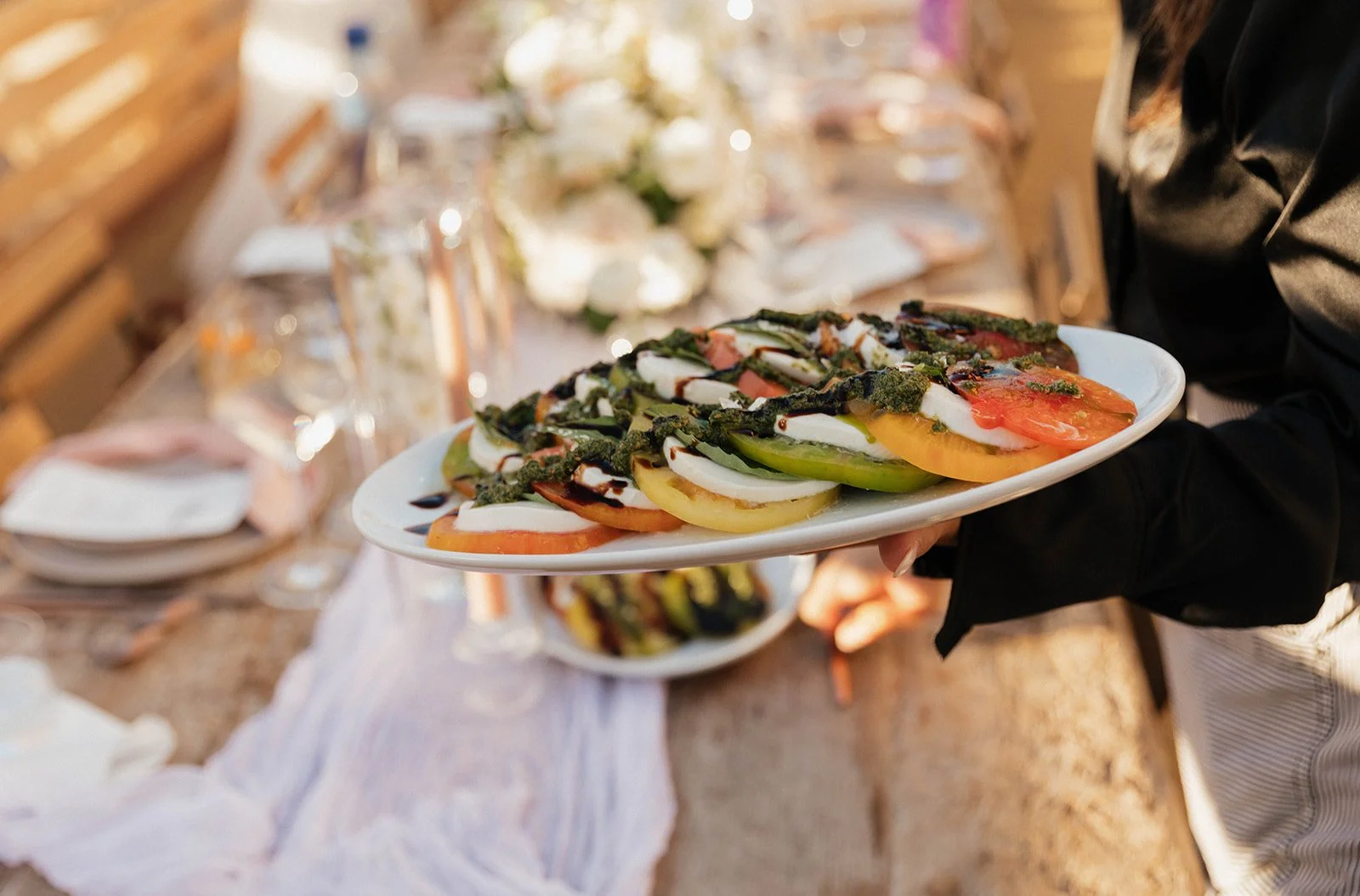 Wedding reception catering with caprese salad platter by Taylor Made Cuisine