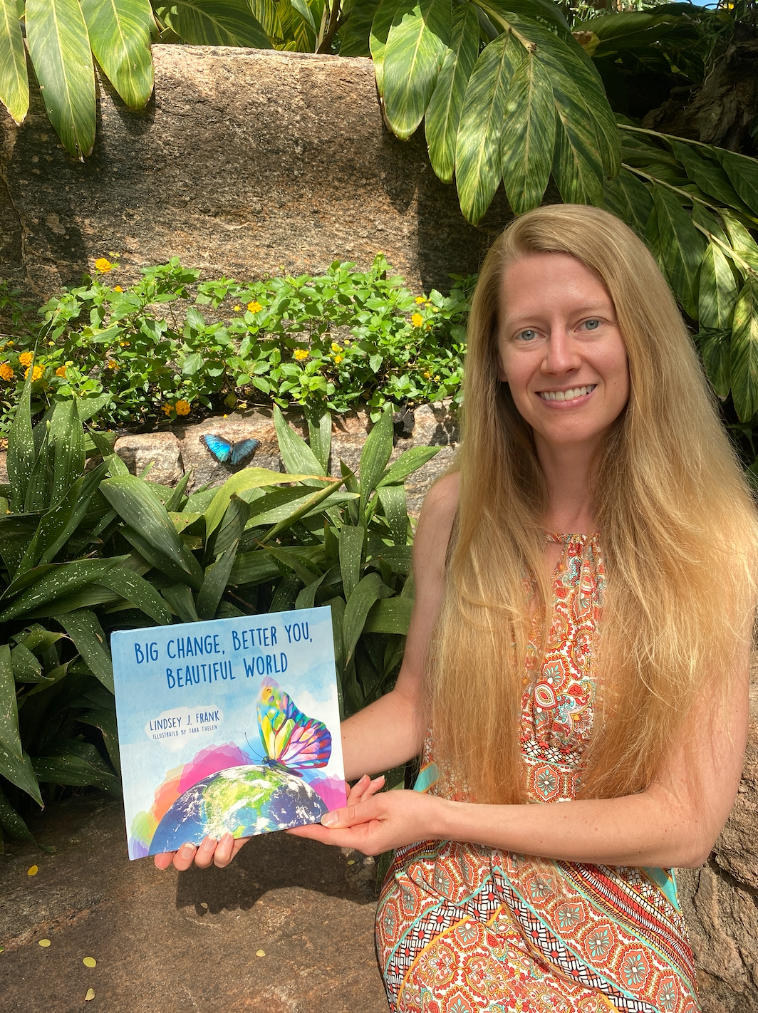 Lindsey Frank with her book, Big Change, Better You, Beautiful World