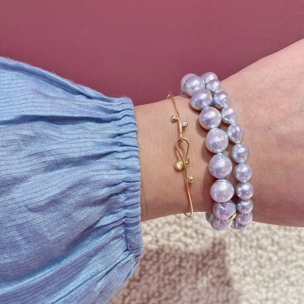 ARMRING MED GULDKUGLER OG BRILLANTER